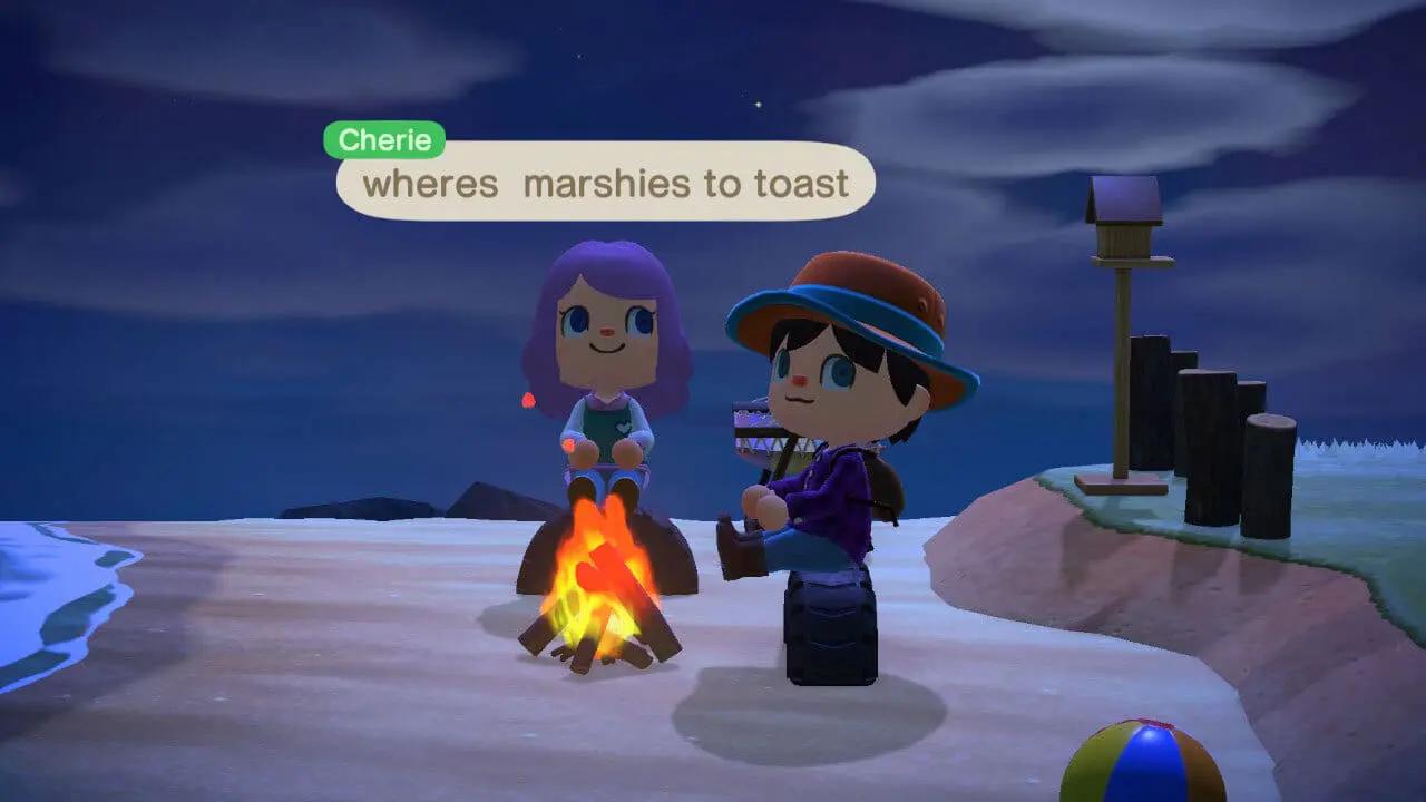 Four friends posing in colorful outfits at night