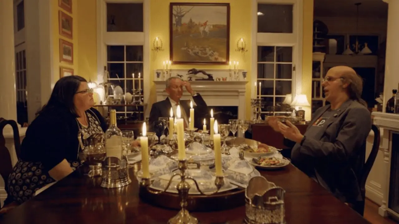 Who Is America? — dinner table still