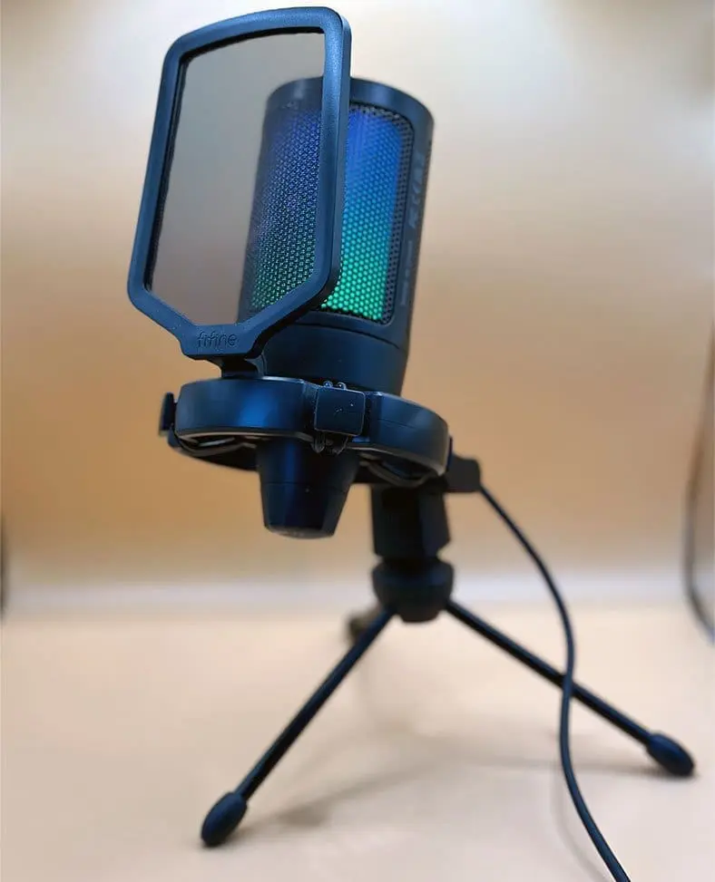 FIFINE A6V on desk — RGB lighting and pop filter