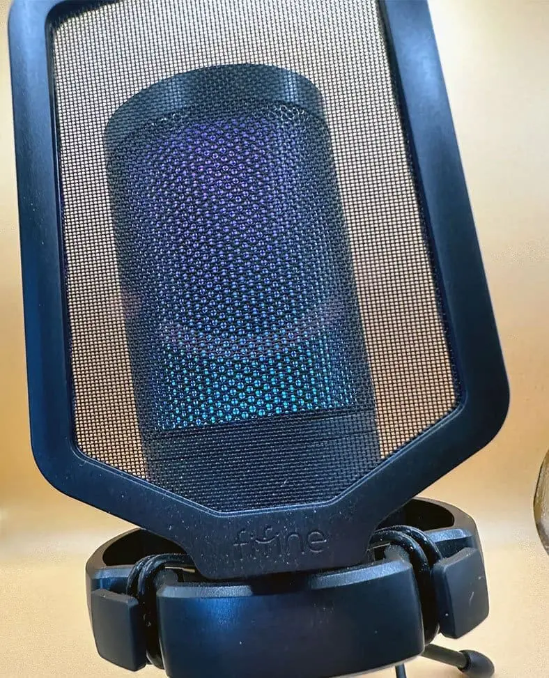 FIFINE A6V close-up — gain knob and pop filter detail