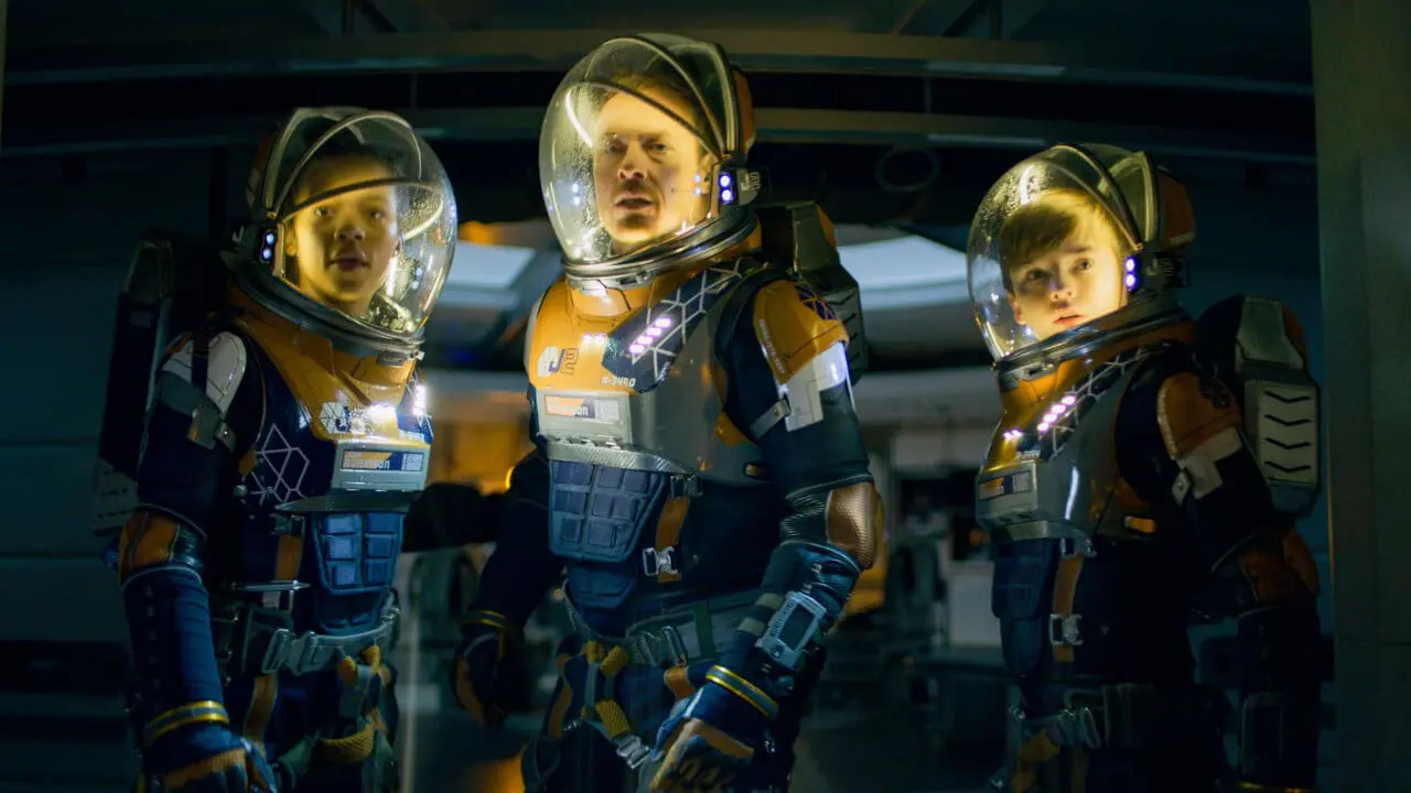 Lost in Space Season 2 key art with the Robinson family and Jupiter 2