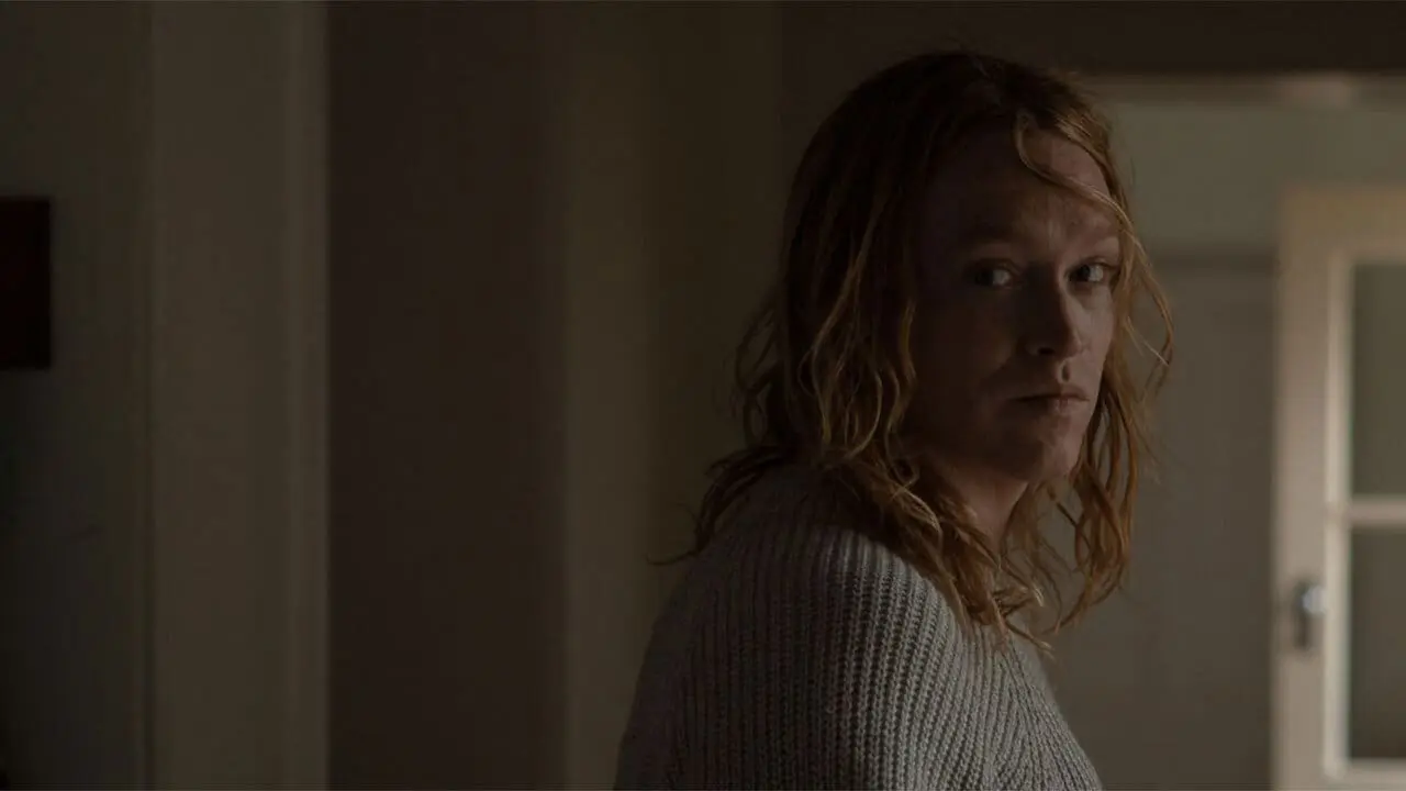 The long-haird Caleb Landry Jones as Nitram