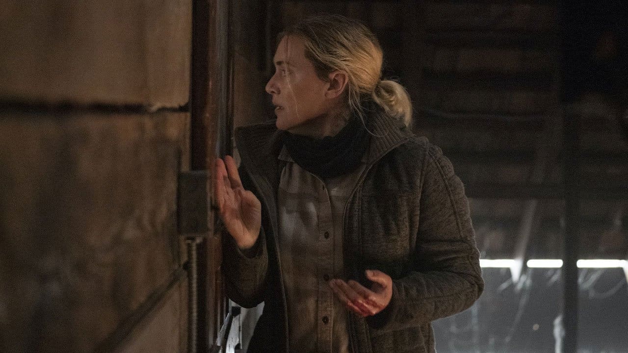 Mare reacts to a shocking confession at a wake