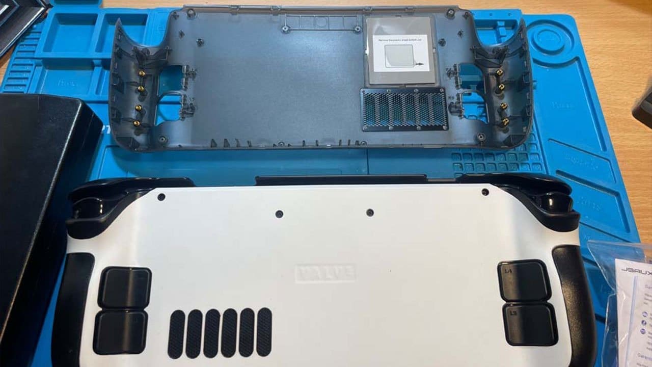 Transparent backplate installed on a Steam Deck showing internals